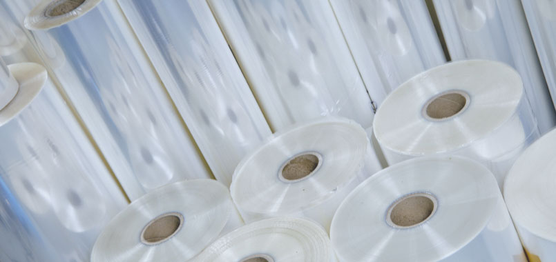 large rollers of plastic film
